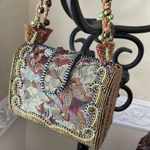 Adorable beaded purse with butterfly detail